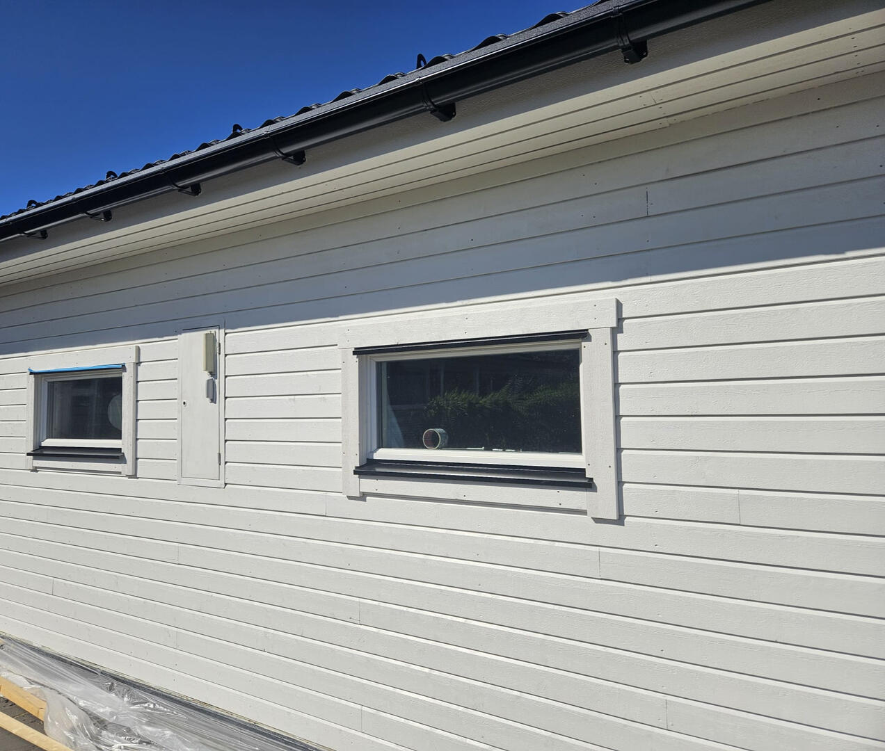 Husbygge med havsutsikt, Grekland